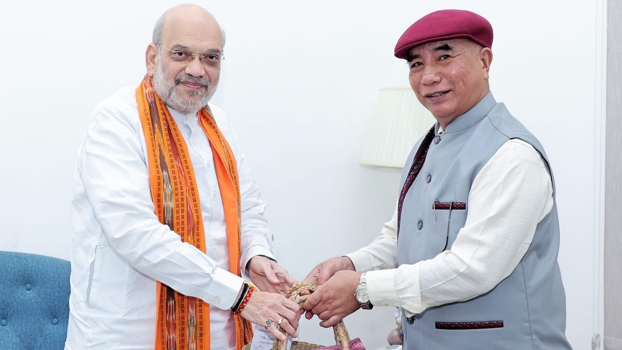 <div class="paragraphs"><p>Home Minister Amit Shah meeting Mizoram CM Lalduhoma in New Delhi on August 1.</p></div>